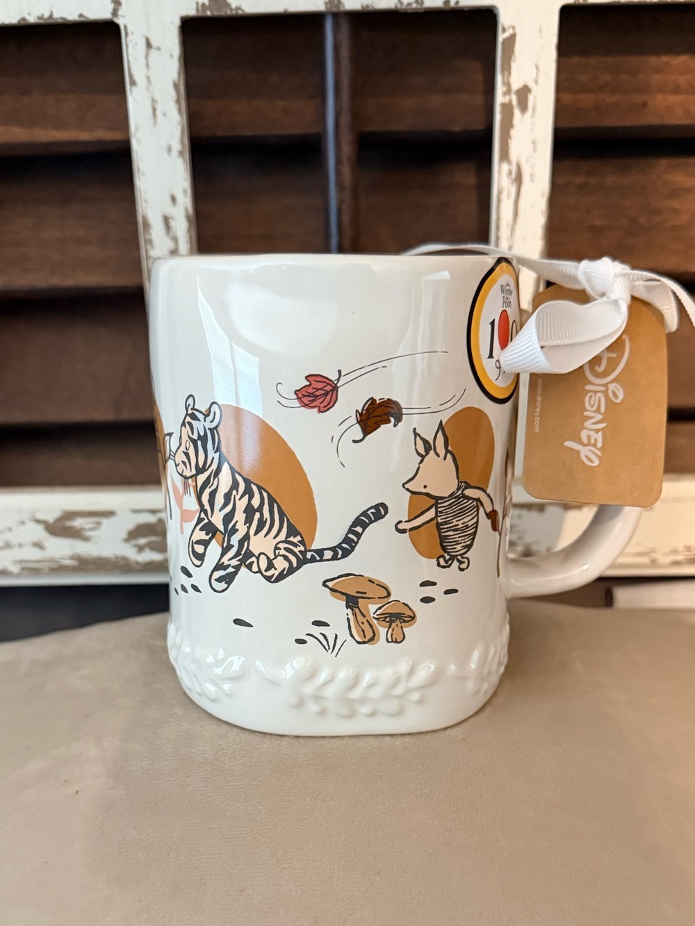 Rae Dunn x Disney White Ceramic Winnie the Pooh Mug with Gold & Brown Accents